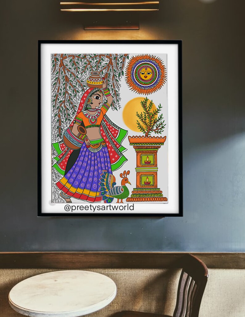 May include: A colorful folk art painting depicting a woman in a purple and green sari carrying a pot on her head, standing near a small shrine with a peacock and a sun with a face. The painting is signed "@preetyartworld".