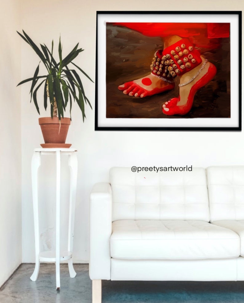 May include: A painting of a pair of feet wearing red anklets with gold bells. The feet are painted in a red color with a red dot on the big toe of each foot. The background is a dark brown color.