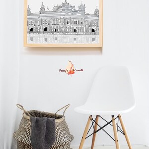 May include: A black and white line drawing of a building with a dome, surrounded by a fence. The drawing is framed in a light wood frame and hanging on a white wall. The drawing is reflected in the glass of the frame.