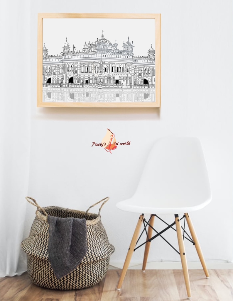 May include: A black and white line drawing of a building with a dome, surrounded by a fence. The drawing is framed in a light wood frame and hanging on a white wall. The drawing is reflected in the glass of the frame.