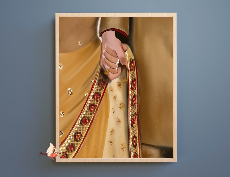 May include: A close-up of a couple holding hands, the woman wearing a gold and red sari, the man wearing a gold sherwani.