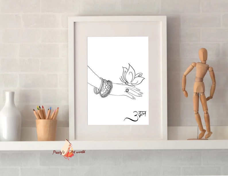 May include: Black and white line art print of a hand with bangles and a butterfly. The word "उड़ान" is written in Hindi script below the image.
