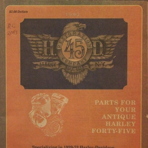 May include: A vintage advertisement for Harley-Davidson motorcycle parts. The ad features a logo with a stylized eagle and the text "Restoration Company NY". The ad also includes the text "Parts for your Antique Harley Forty-Five" and the phone number (518) 459-5012.