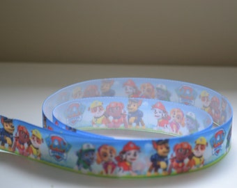 Paw Dogs Puppies 7/8 inch Pups Sitting Running Grosgrain Ribbon on Boy Patrol Grass & Sky Background