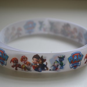 Paw Dog Pups 7/8-inch Boy and Puppies Sitting Laughing Patrol Grosgrain Ribbon White Background