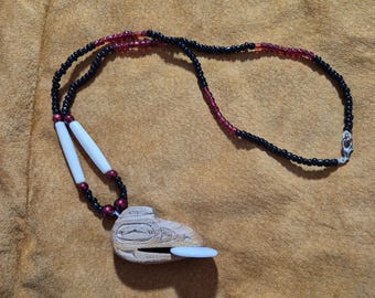 Tlingit Hand Carved, Raven with Sun necklace