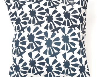 Navy and white 'cut out floral' cushion cover.