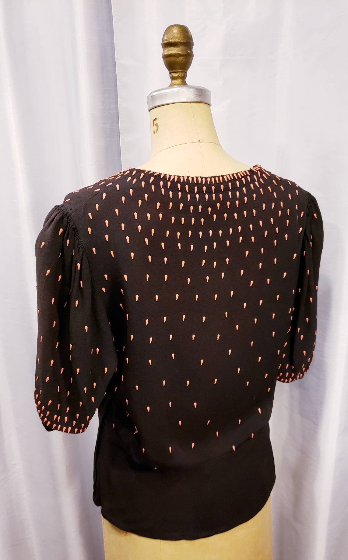 hot pink and black blouse