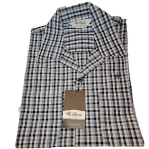 May include: A white, black, and gray plaid button-down shirt with a pocket on the left side. The shirt has a label that says "Mr. California - Since 1962".