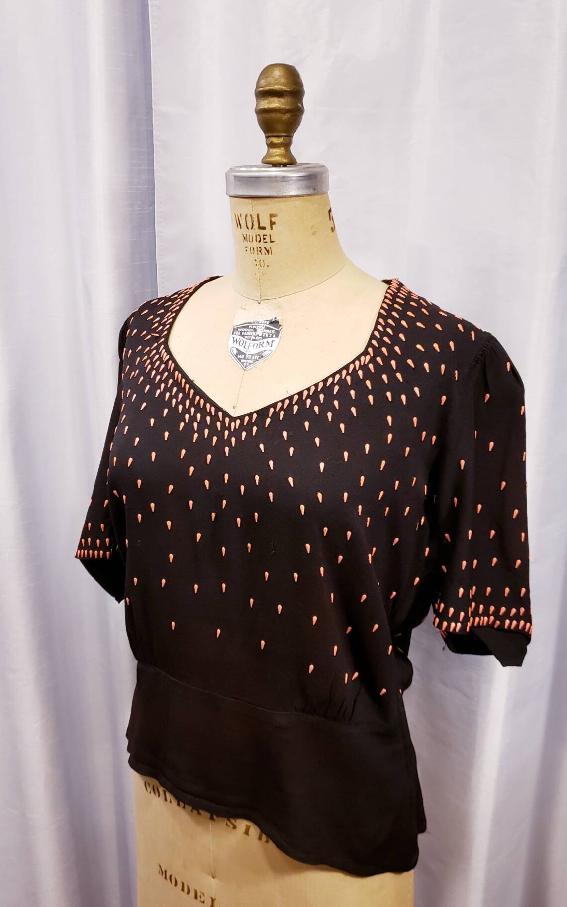 hot pink and black blouse