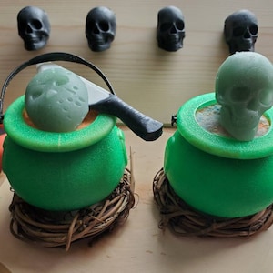 Witches brew Cauldrons with toppers.