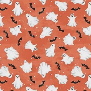 May include: A repeating pattern on an orange background featuring white ghosts with black eyes and mouths, interspersed with small black bats in various flight positions and tiny white stars scattered throughout the design.