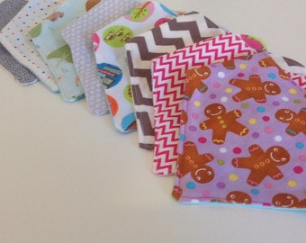 Set of 3 reversible bandana/ dribble bibs. Your choice of three designs! On trend, modern bandanna/ napkin bibs for your baby.