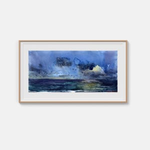 May include: A framed watercolor painting depicting a dark, stormy seascape under a deep blue sky with heavy clouds. The ocean surface shows deep indigo and teal tones with a subtle light reflection, while a flock of birds flies across the horizon.
