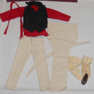 May include: A set of doll clothes including a red shirt, black vest, white pants, and brown boots.