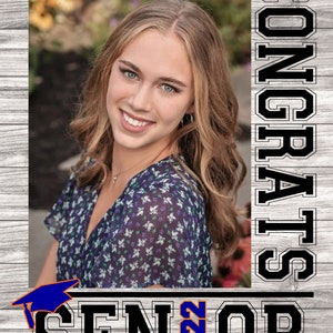 May include: A graduation announcement with a photo of a young woman in a floral dress. The announcement has a blue and orange graduation cap with the word "Senior 2022" and the word "Congrats" in black letters.