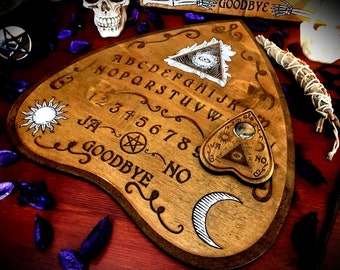 Ouija board &quot;The Mystical Eye&quot; occult paganism wicca divination magic witchcraft medium occultism spiritism spell  pagan symbolism satanism