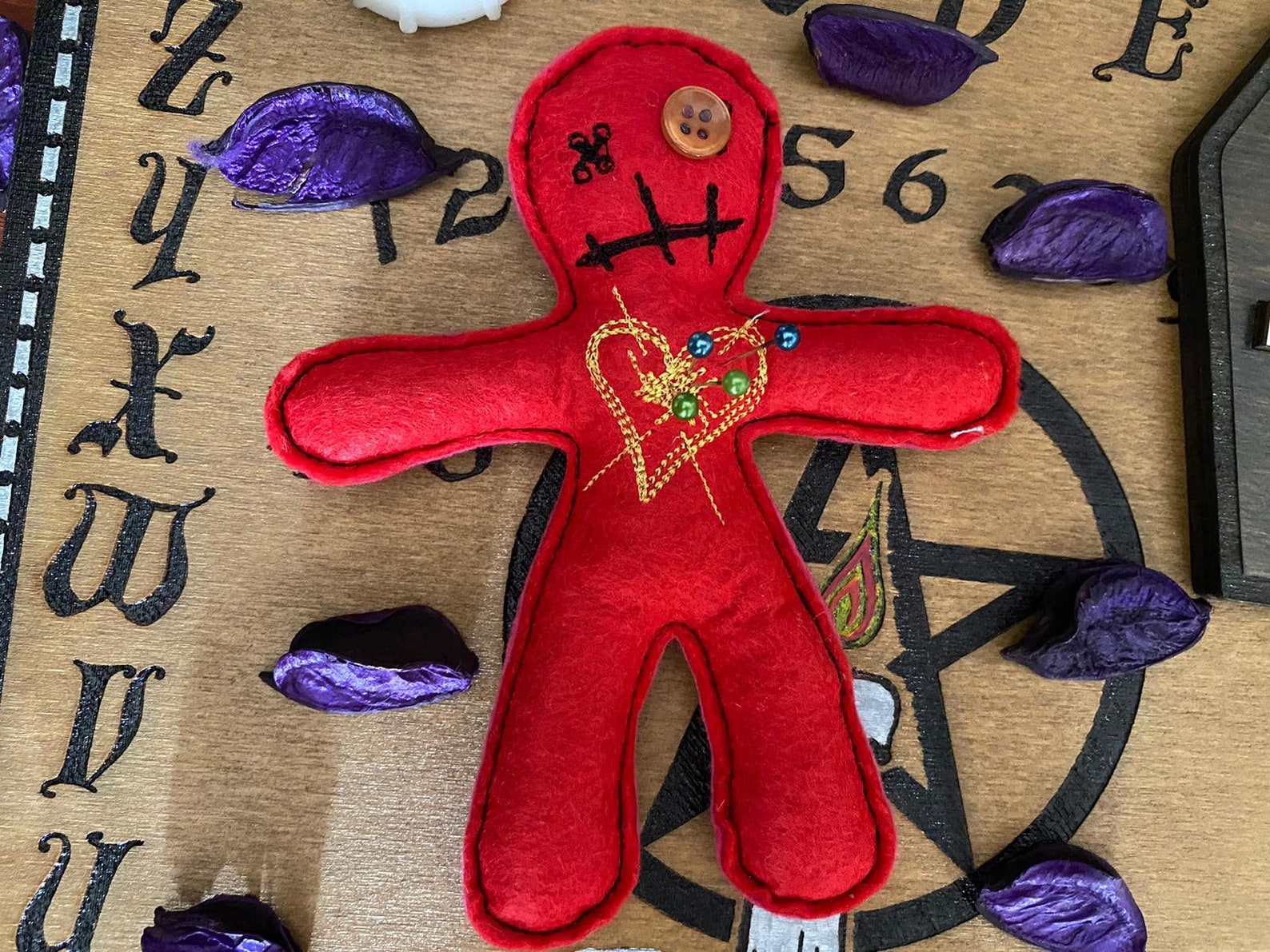 witch with voodoo doll