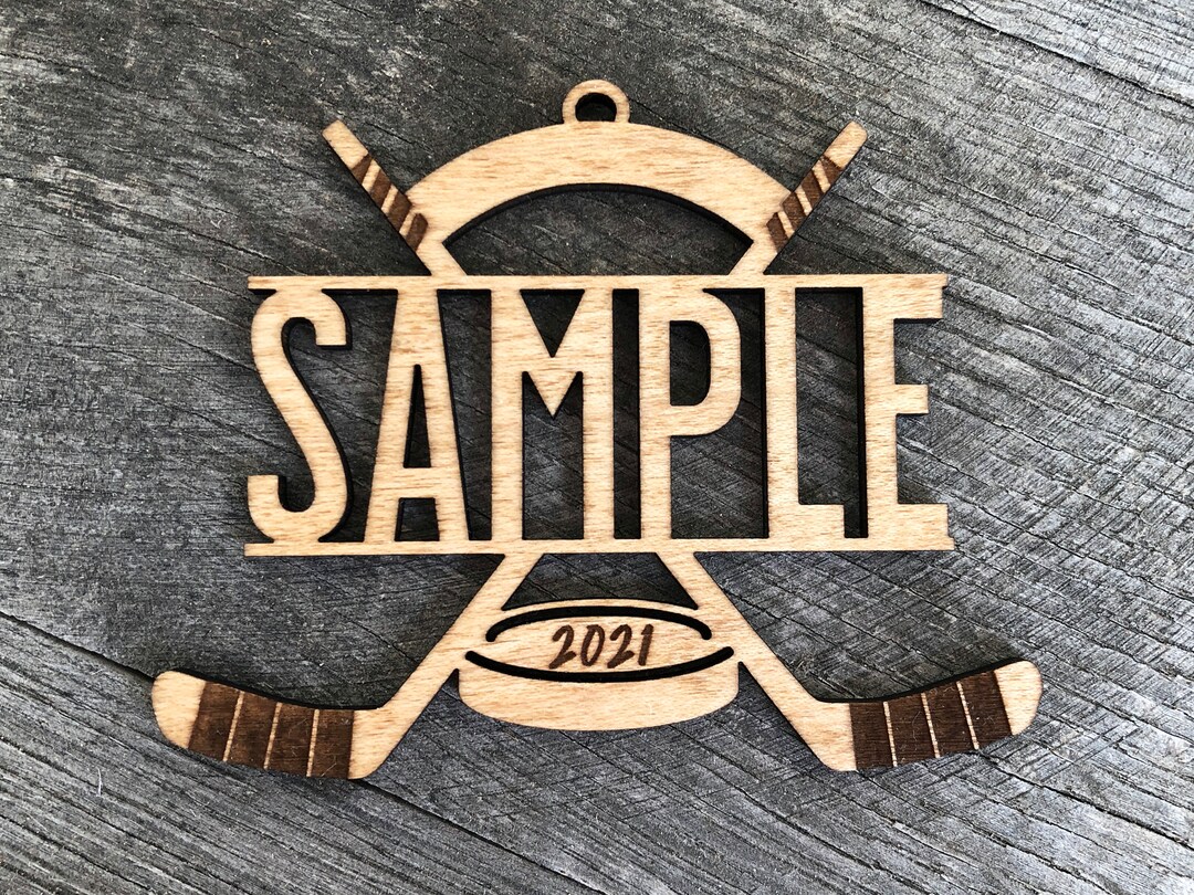 Personalized Double Hockey Sticks Ornament With Puck and Year for