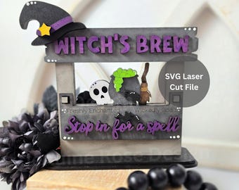 May include: A Halloween-themed wooden sign with the text "Witch's Brew" in purple letters. The sign features a witch's hat, a skull, a cauldron with green bubbling liquid, and the phrase "Stop in for a spell". The sign is a laser cut file.