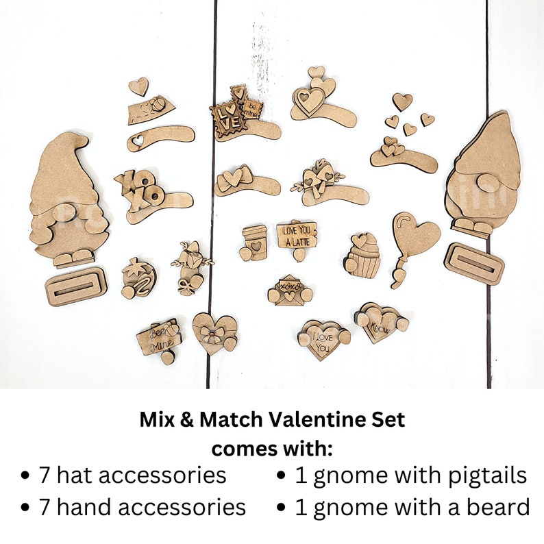 Puede incluir: Un conjunto de suministros de artesan&iacute;a de gnomos de madera para el D&iacute;a de San Valent&iacute;n. El conjunto incluye dos gnomos, uno con trenzas y otro con barba, junto con siete accesorios para sombreros, siete accesorios para manos y varias otras decoraciones con tem&aacute;tica del D&iacute;a de San Valent&iacute;n. El texto de la imagen dice "Mix & Match Valentine Set comes with: 7 hat accessories, 1 gnome with pigtails, 7 hand accessories, 1 gnome with a beard."