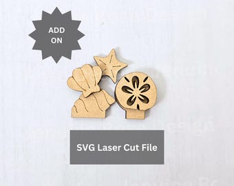 May include: A set of light brown laser-cut wooden shapes featuring a seashell, a starfish, and a sand dollar. A dark gray starburst icon contains the text ADD ON, and a dark gray rectangular box contains the text SVG Laser Cut File.