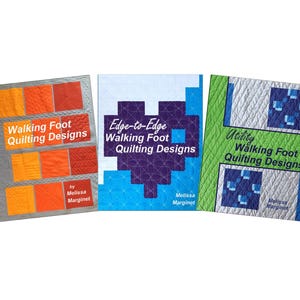 Peut inclure: Trois livres de motifs de quilting avec des couvertures colorées. Le premier livre est intitulé "Walking Foot Quilting Designs" et a une couverture rouge, orange et grise. Le deuxième livre est intitulé "Edge-to-Edge Walking Foot Quilting Designs" et a une couverture bleue, violette et blanche. Le troisième livre est intitulé "Utility Walking Foot Quilting Designs" et a une couverture verte, bleue et blanche.