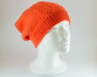 Hand knitted slouchy hat or beanie made from very soft 100% acrylic wool.  The perfect addition to your winter wardrobe.