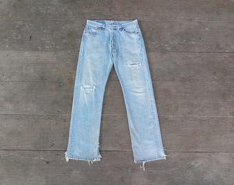 Effet vieilli, Levi's 501 W33 L32 : délavé, déchiré, fabriqué aux États-Unis