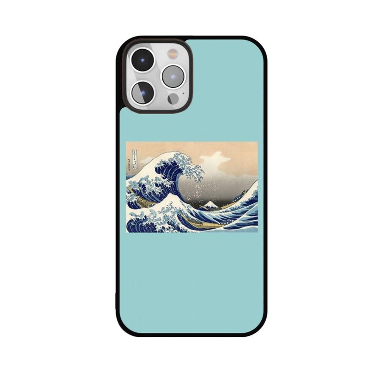 May include: A light blue phone case with a black border. The case features a print of Hokusai's "The Great Wave off Kanagawa." The artwork depicts a large wave with a mountain in the background. The phone case has a camera cutout.