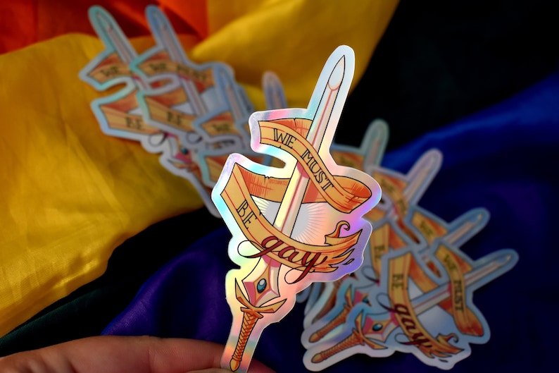 She-Ra inspired We Must Be Gay Funny 10cm holographic sticker image 1