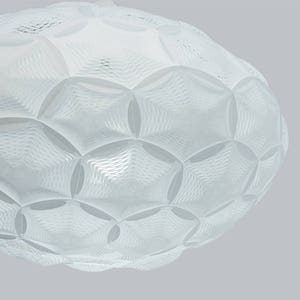 May include: White ceiling light fixture with a geometric, honeycomb-like design. The light fixture is made of a translucent material and has a rounded shape.