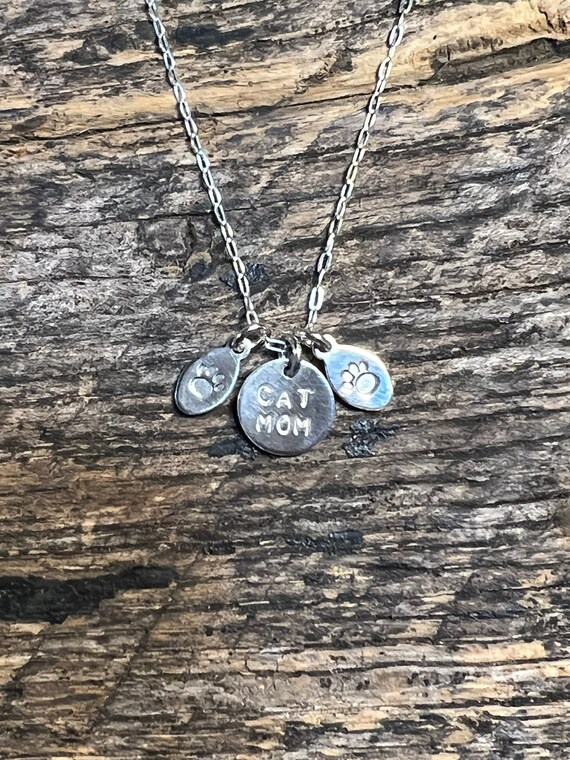 cat mom with 2 paw charms in sterling silver