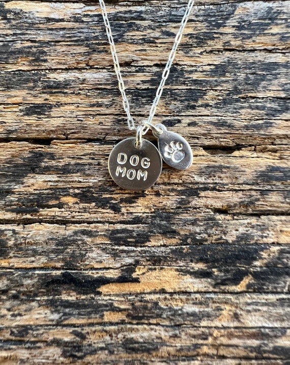 dog mom necklace with paw charm in sterling silver