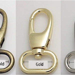 May include: Three metal swivel clasps in antique-gold, gold, and silver finishes. Each clasp has a lobster claw style hook and a D-ring base. The image shows the colour variations available.