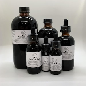 May include: A collection of dark glass bottles with black droppers and white labels. The labels read "Mullein Leaf" and include text about the product. The bottles vary in size, with the largest holding 16 fluid ounces.