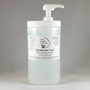 May include: A clear plastic bottle with a white pump dispenser filled with a clear liquid. The bottle is labeled "Hyaluronic Acid Moisturizing Serum 32 oz (950 ml)" and "Pure Health Botanicals". The ingredients are listed on the bottle.