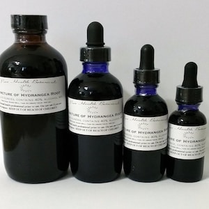 May include: Four dark glass bottles of varying sizes, filled with a dark liquid. Each bottle has a white label with black text that reads "Tincture of Hydrangea Root." The bottles have black droppers and blue bottle necks.