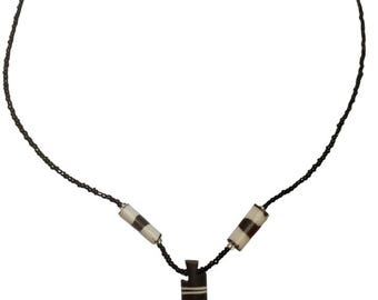 Hand Carved Bone Fang Pendant Necklace: Tribal Warrior Jewelry - black, white