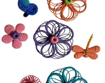 A unique collection of handmade wire refrigerator magnets - sold as a set of 7