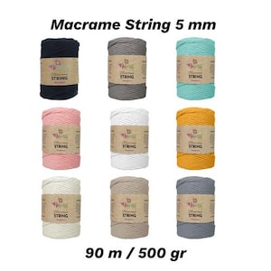 May include: Nine spools of 5 mm macrame string in assorted colours, such as black, grey, and teal. Each spool has a label with the text "Macrame String" and the dimensions 90 m / 500 gr.