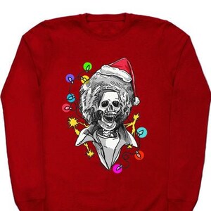 May include: Red Christmas sweater with a skeleton wearing a Santa hat and surrounded by colorful Christmas lights.