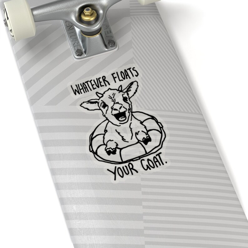 May include: A black and white sticker with a goat in a life preserver. The text reads "Whatever floats your goat."