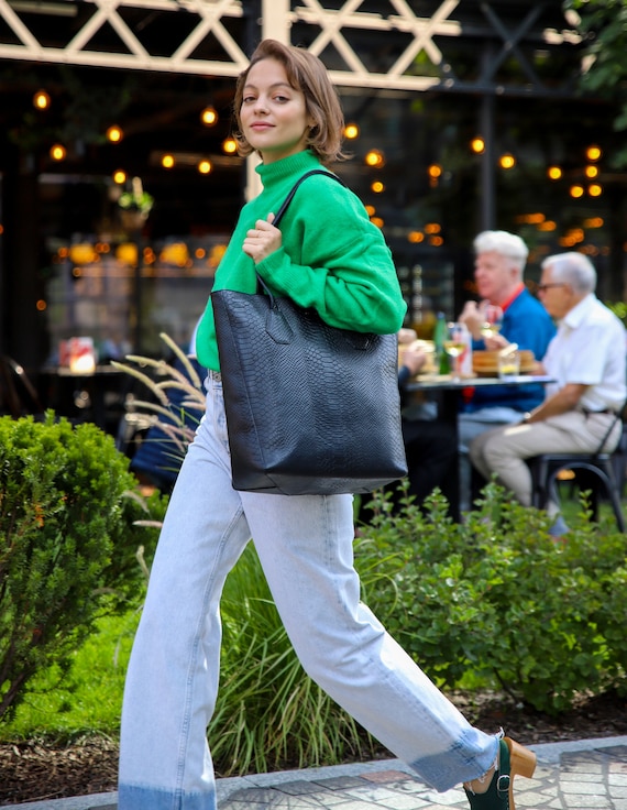 Black embossed shoulder bag