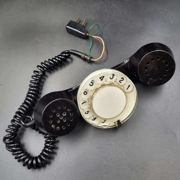 Vintage Rotary Handset with a Dialer. Wireman Gadget. Testing Dial Handset. Old Soviet Phone Receiver with a Dialing Disk.