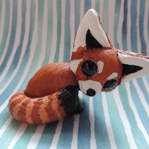 Polymer clay red panda figurine