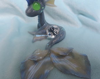 Blue polymer clay water dragon