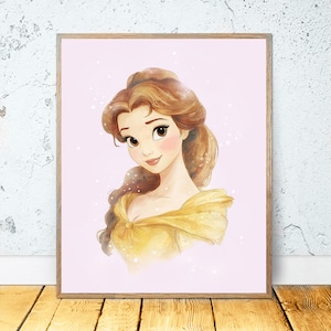 May include: A framed watercolor print of a woman with brown hair and a yellow dress. The woman is smiling, and the background is a light pink color with white sparkles. The frame is a light brown color.