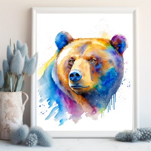 Puede incluir: Pintura de acuarela de la cabeza de un oso marr&oacute;n con salpicaduras de color azul, morado y amarillo.