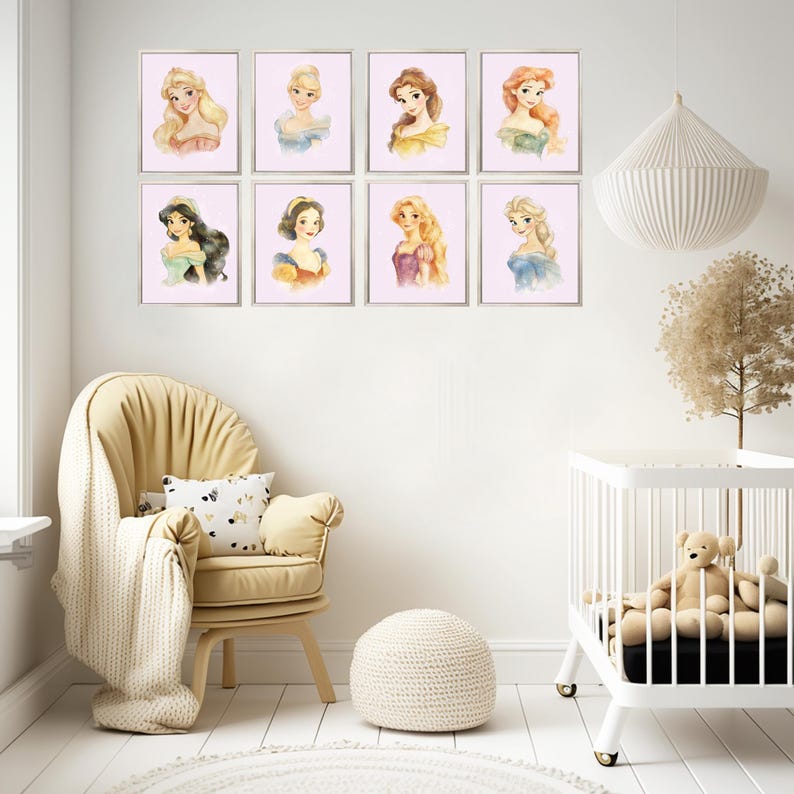 May include: Eight framed watercolor prints of Disney princesses with blonde, brown, and black hair, in a nursery setting. The prints are displayed on a light pink background. A yellow armchair, a white crib, and a round ottoman are also in the room.